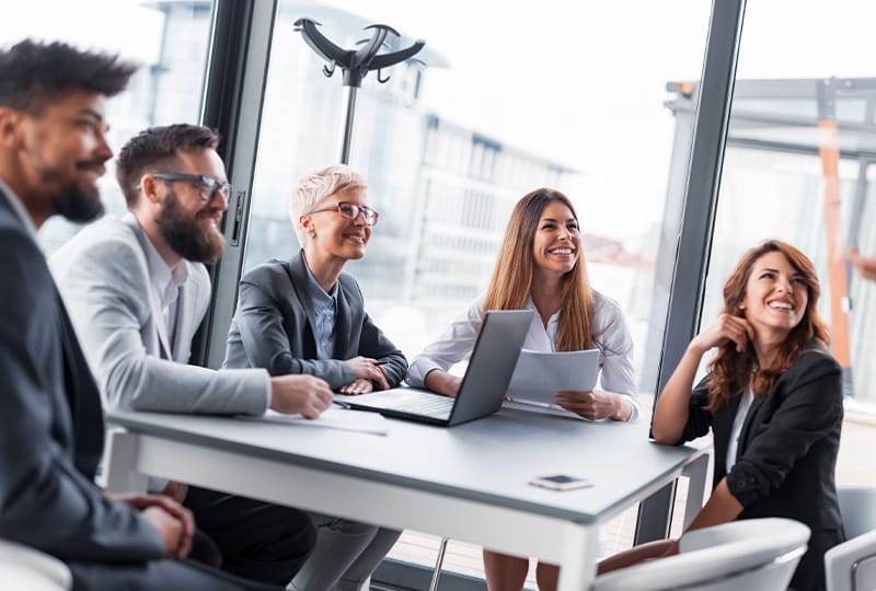 HR managers in a meeting about recruitment agencies